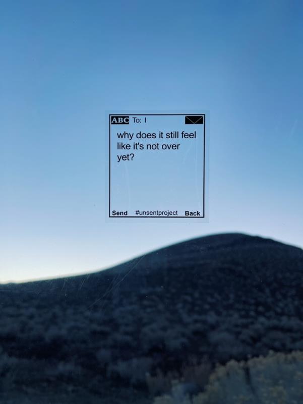 An unsent message displayed against an evening sky